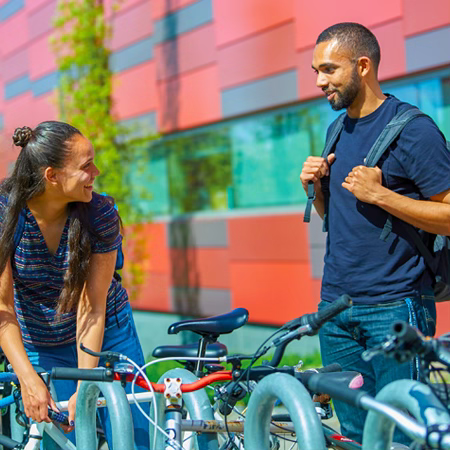 Students locking bike