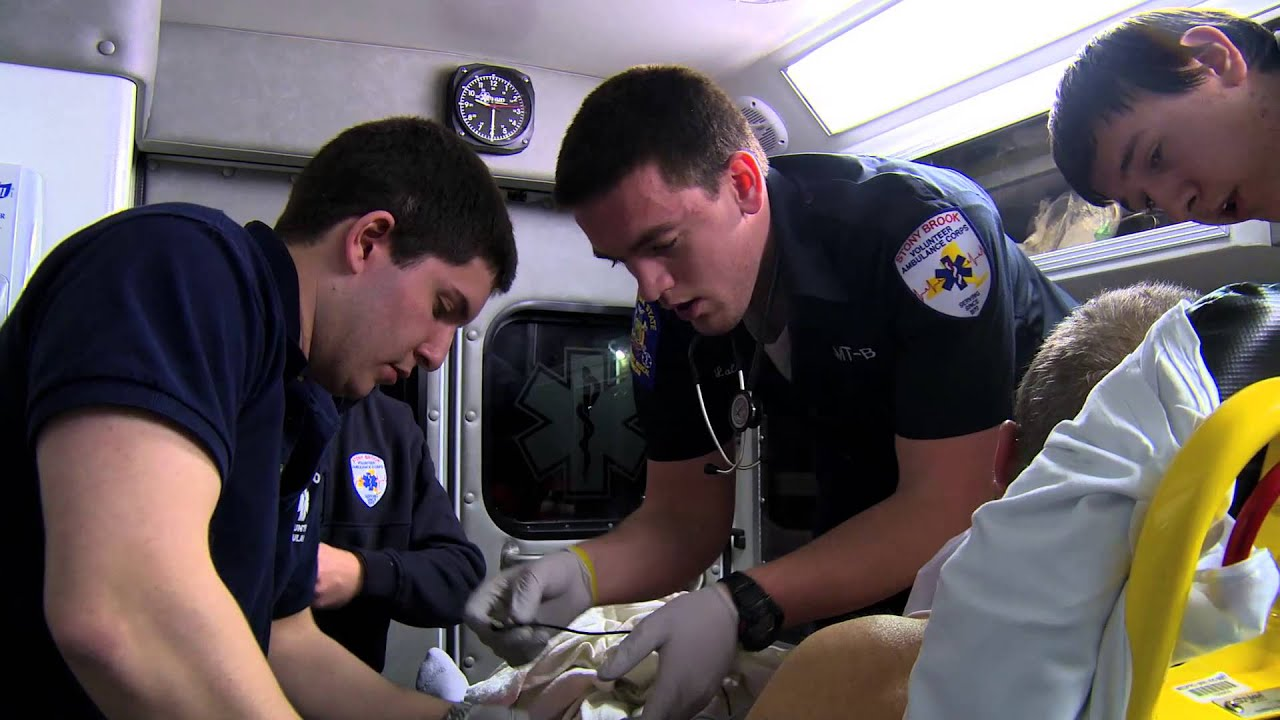 Stony Brook EMT's working on person