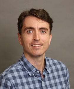 Headshot of Christopher J Percival
