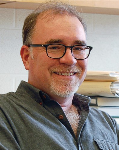 A headshot of P. David Polly