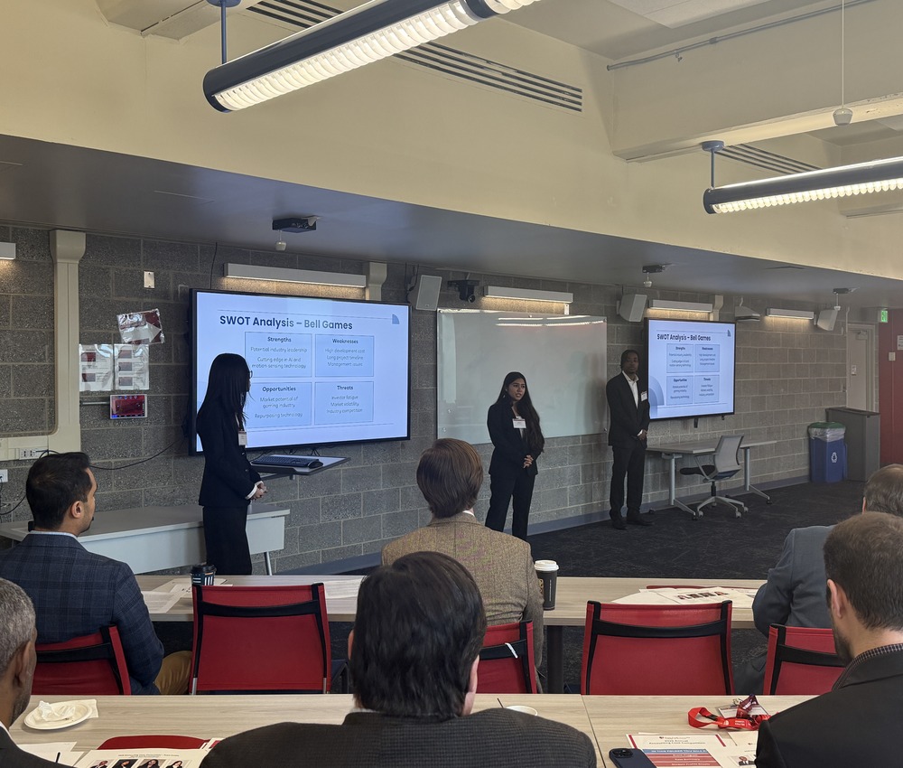 team 2 presenting in front of crowd