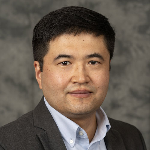 Headshot of Professor Peng Zhang.