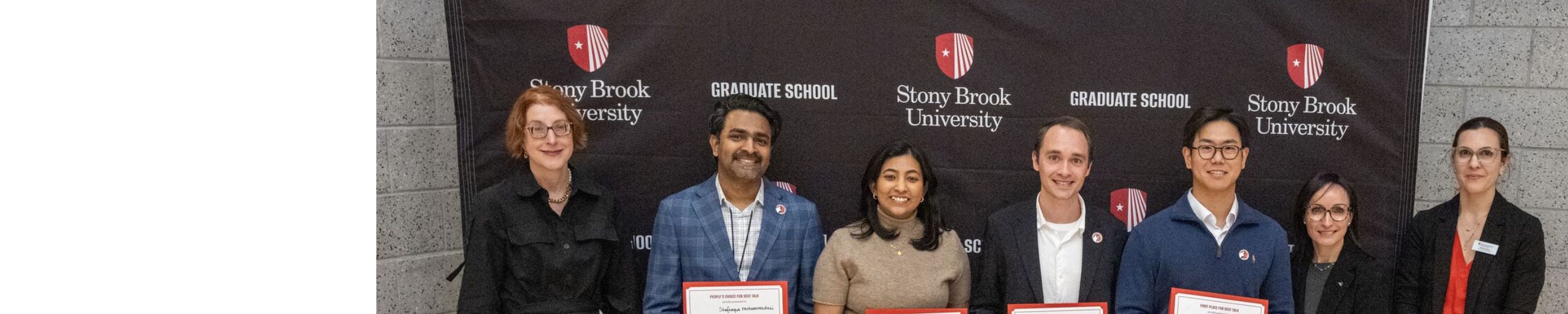Celia Marshik, dean of the graduate school, Monica Bugallo, Interim Vice President for Research and Innovation, and Molly Lotz, Director of Research Training Initiatives, with first, second, and third place winners of the 2026 postdoc spotlight talk,
