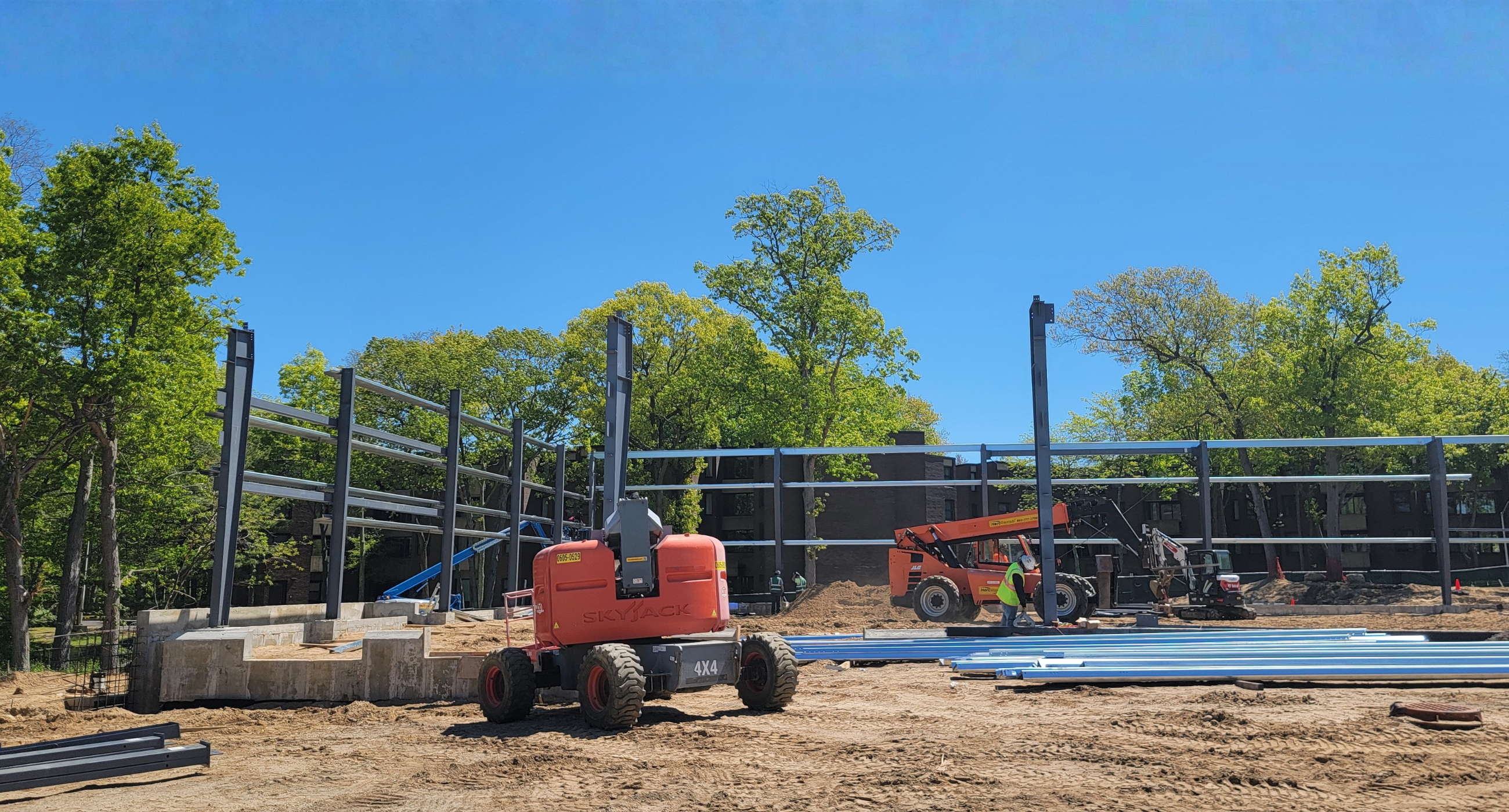 image showing construction site with beams going up at new camus res warehouse site
