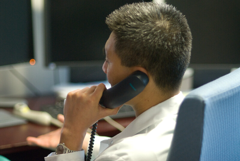 Employee speaking on an office telephone