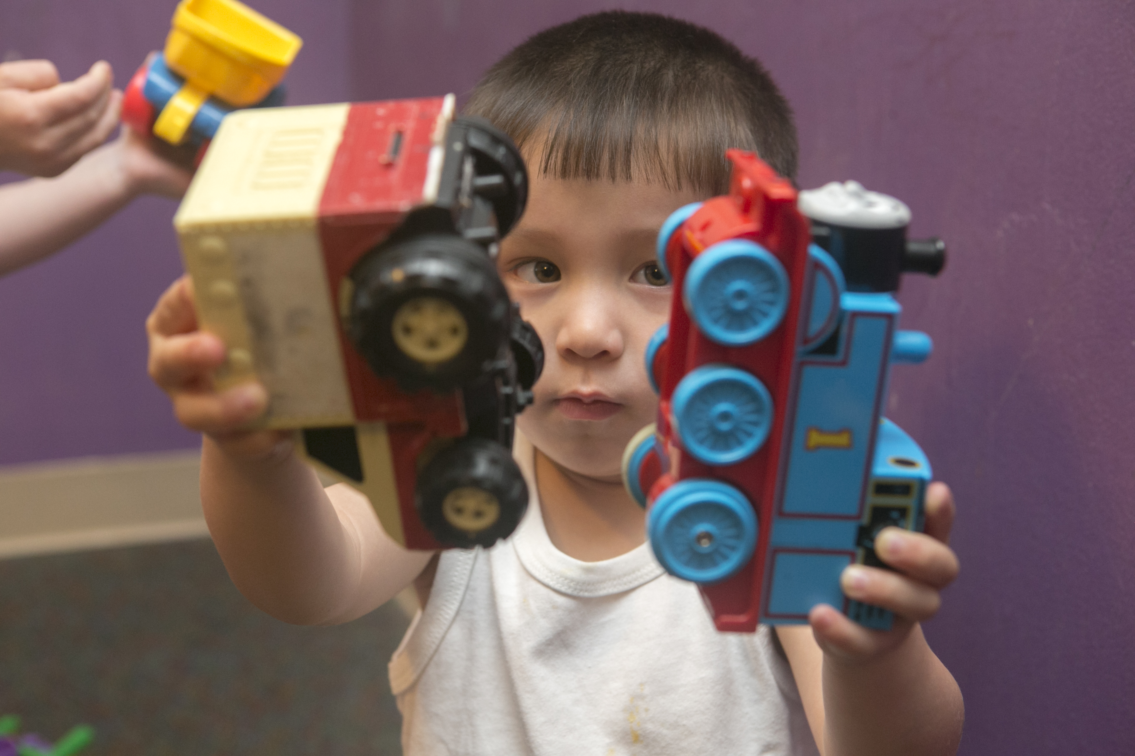 Child playing with trains