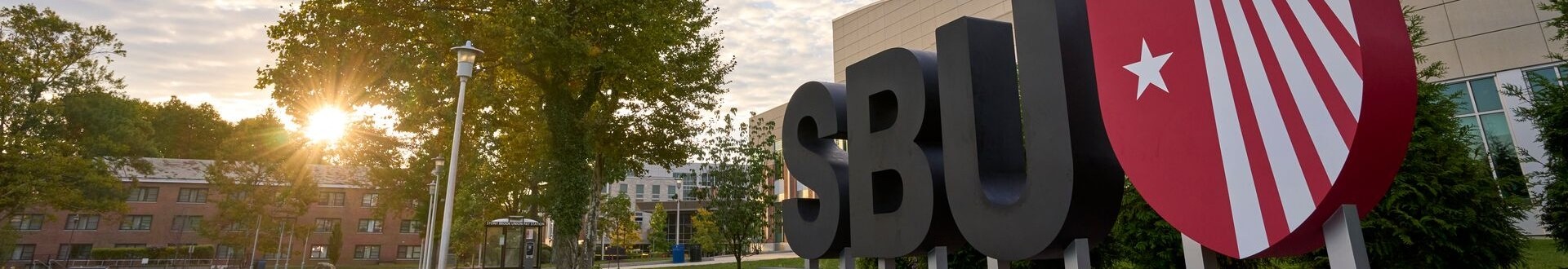 Photo of SBU Landmark Letters, embellished with bold lettering and a brazen shield