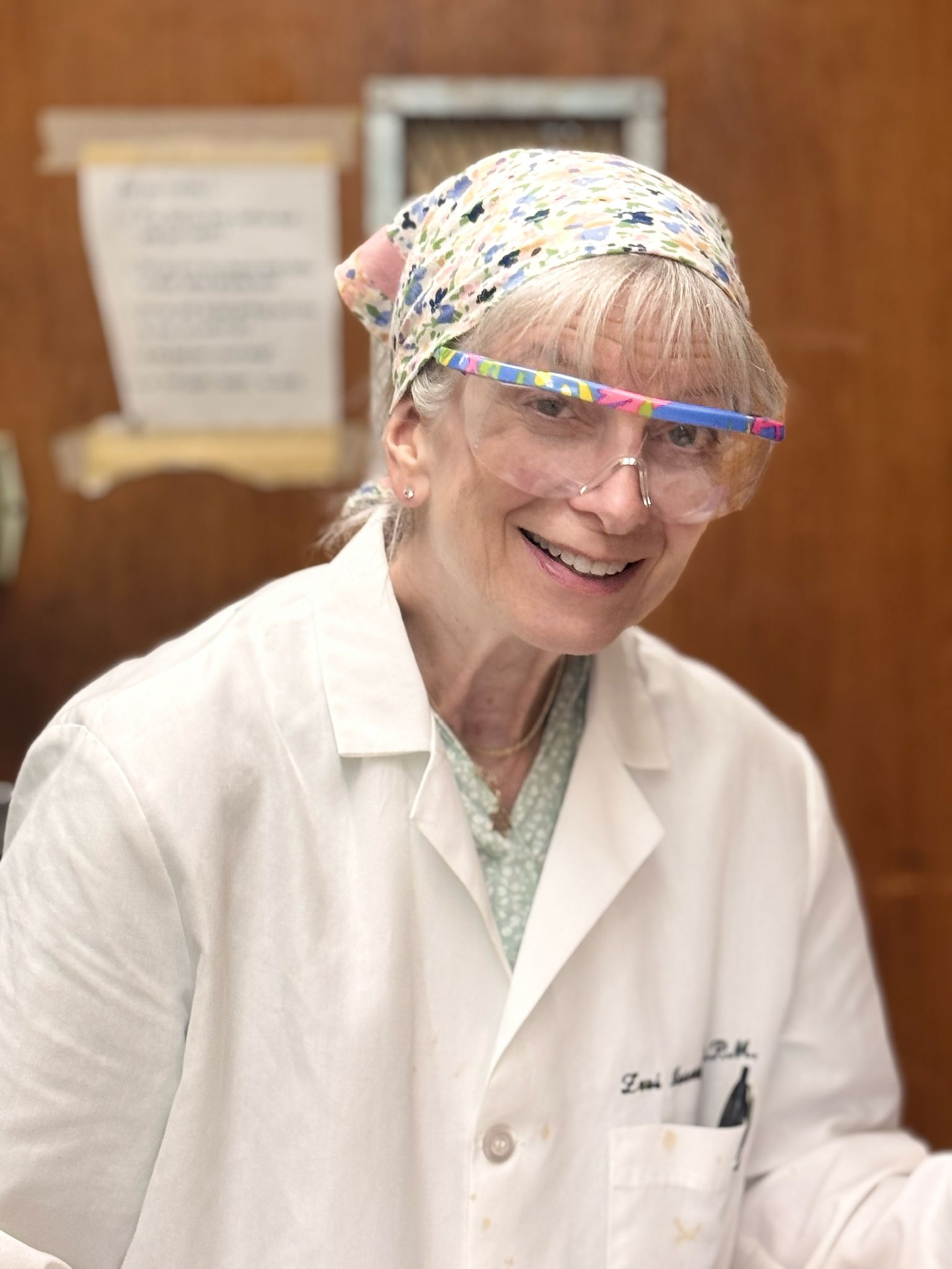Teacher smiling in lab