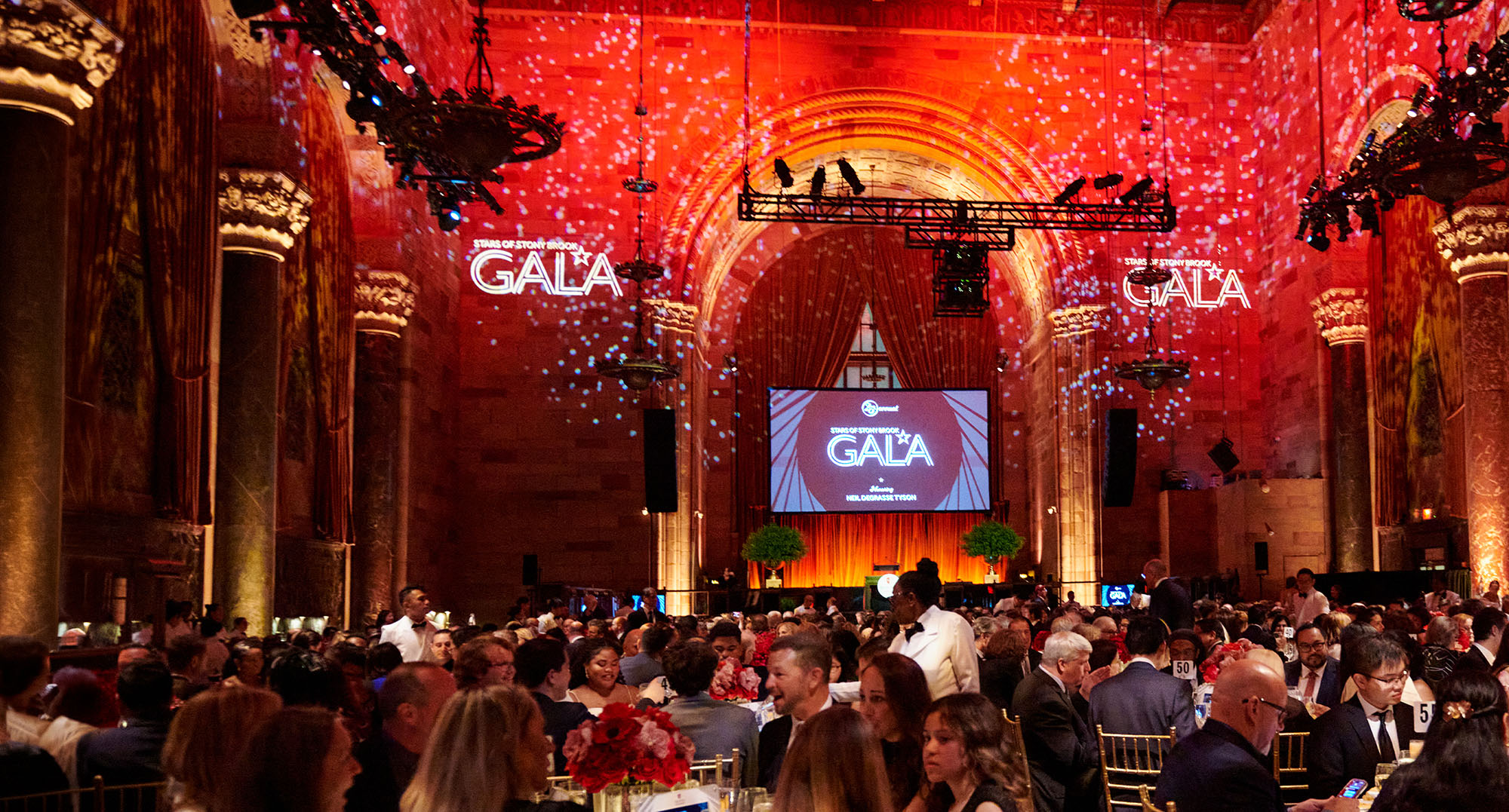 gala ballroom filled with people