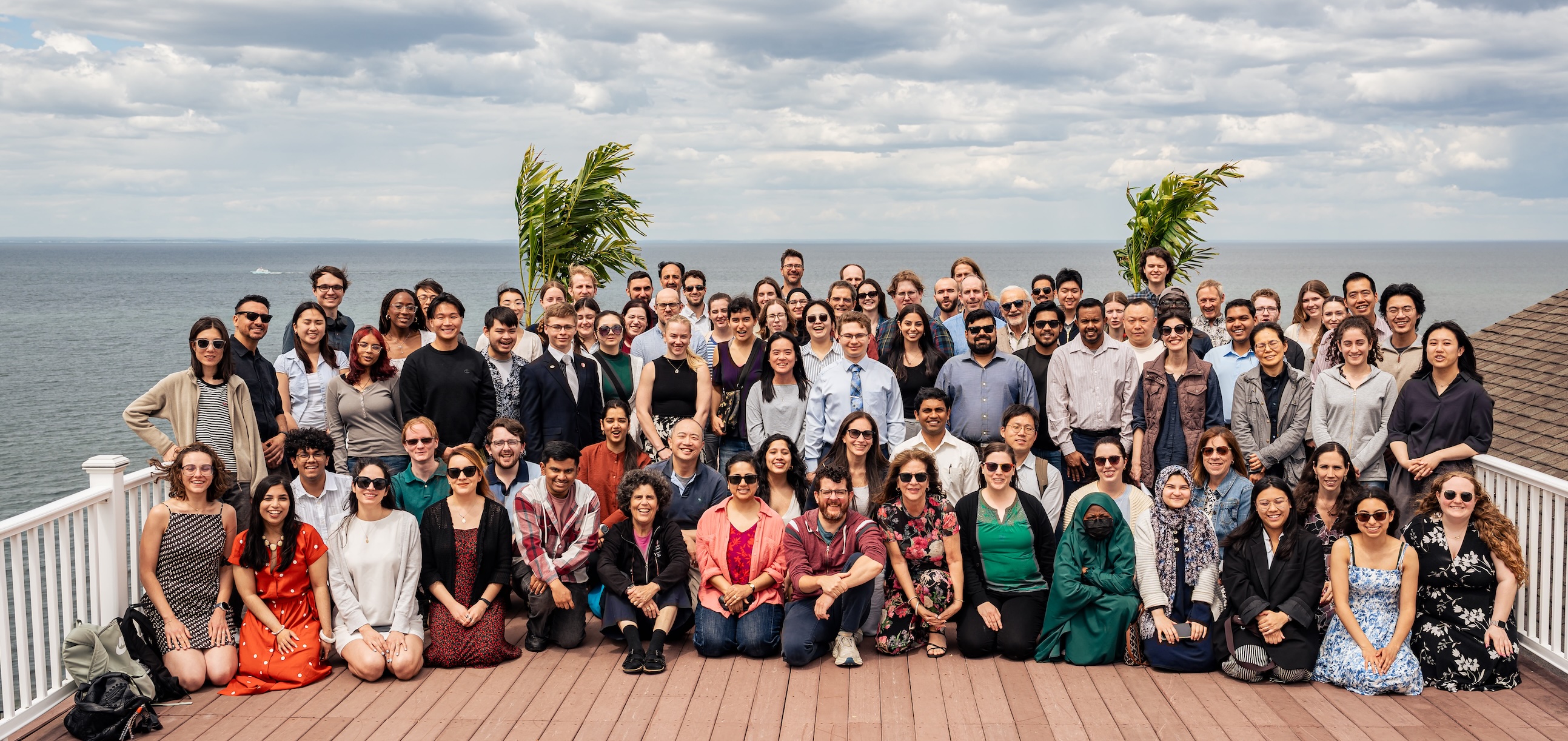 Members of the department at a retreat by the sound