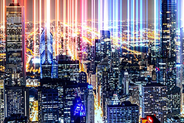 Department of Civil Engineering a city skyline consisting of black buildings, lit up, with stipes of color in the background