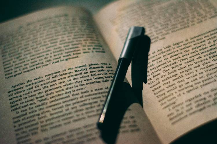 A pen on a book A pen on a book.