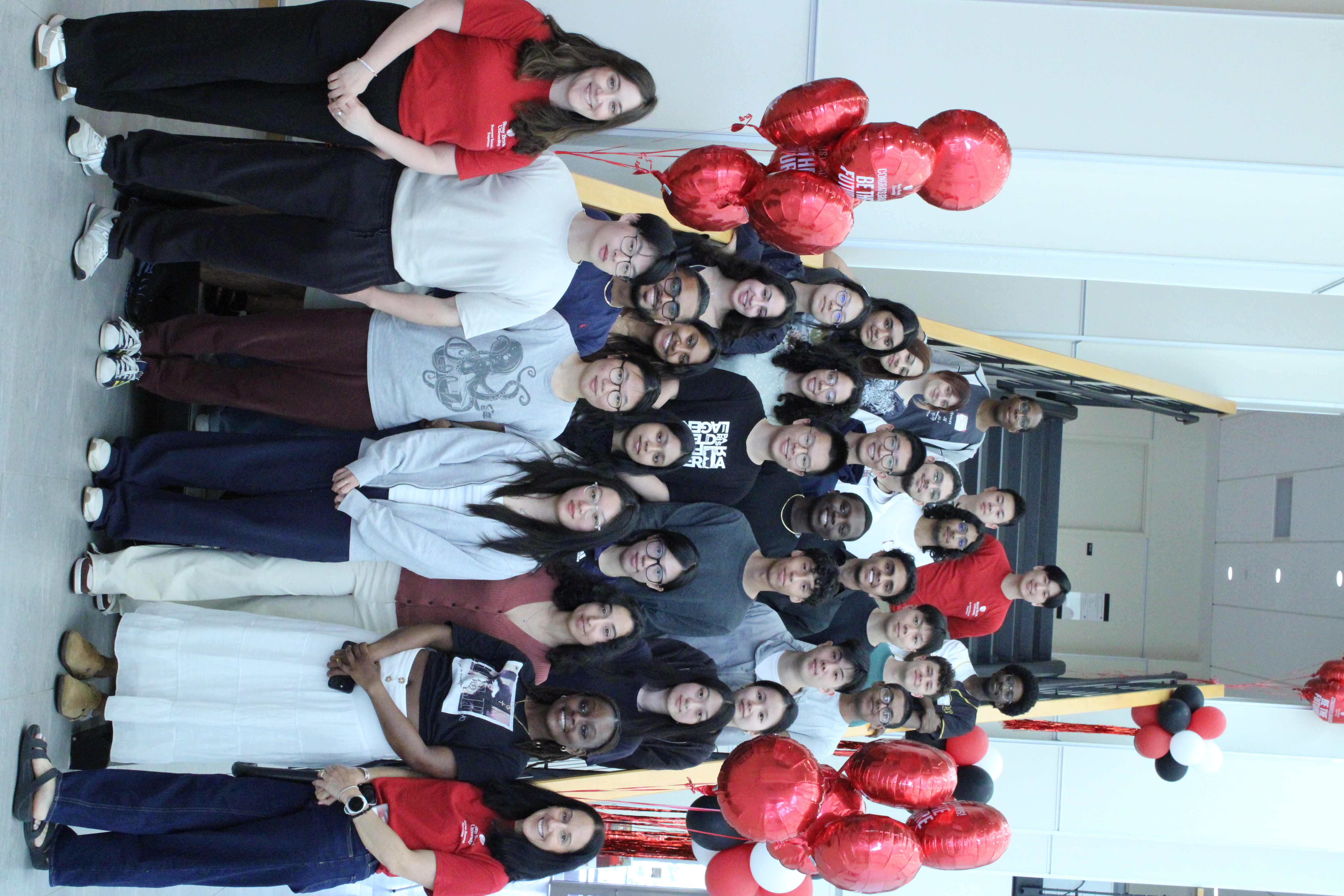 Group photo of 2024 SOAR students and staff along staircase