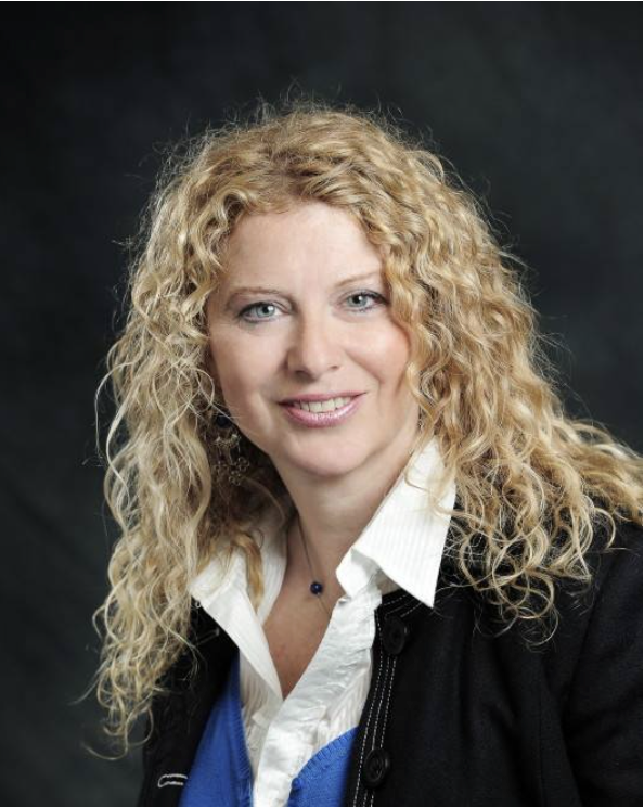 Gallya Lahav Headshot of a woman with curly blond hair