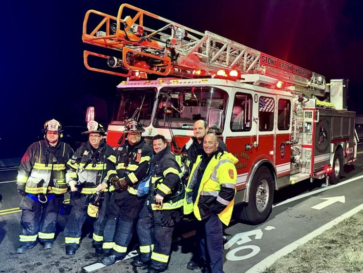 fire crew in front of fire truck