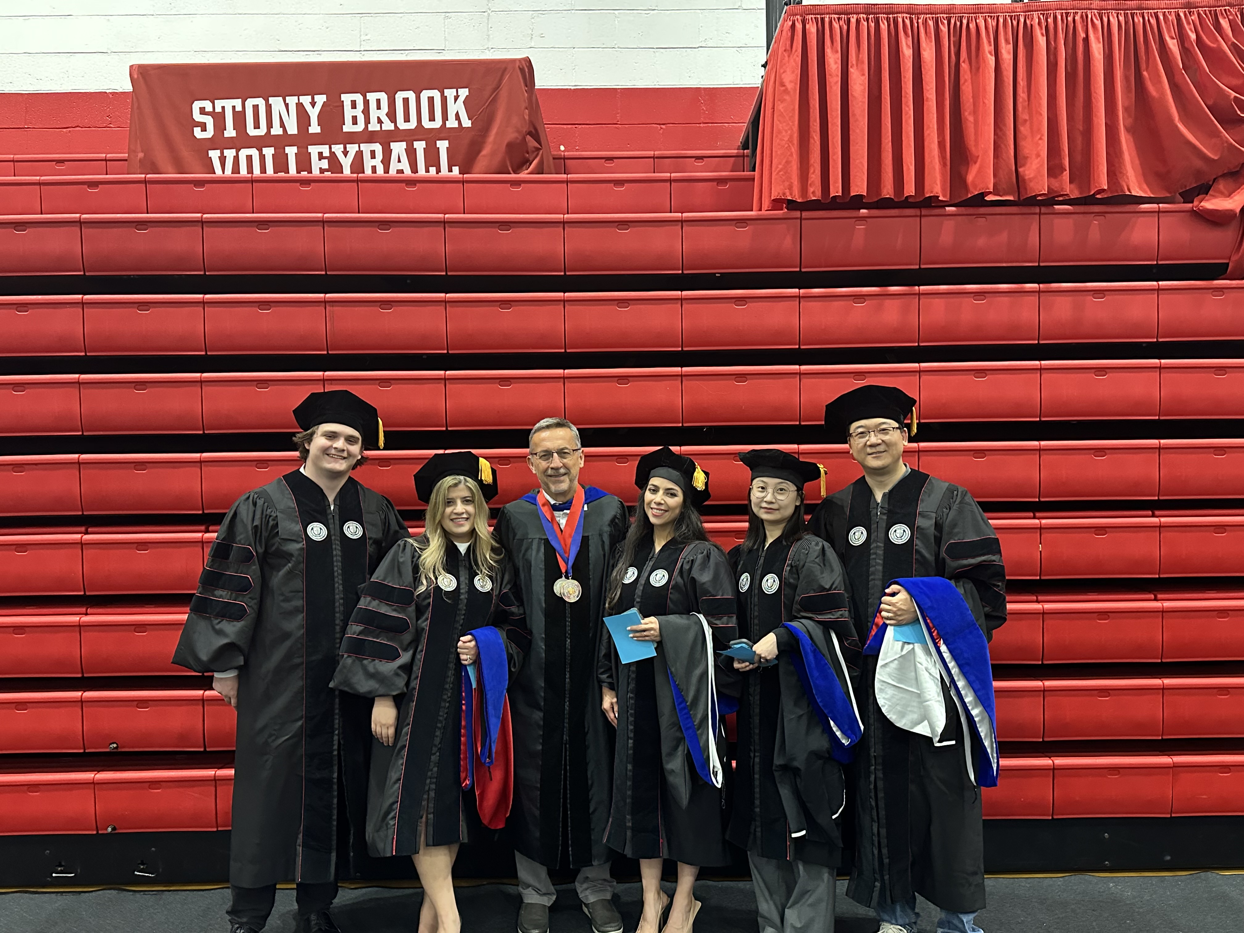 A group of PhD graduates, alongside Zahraa, with Professor Petar Djuric.