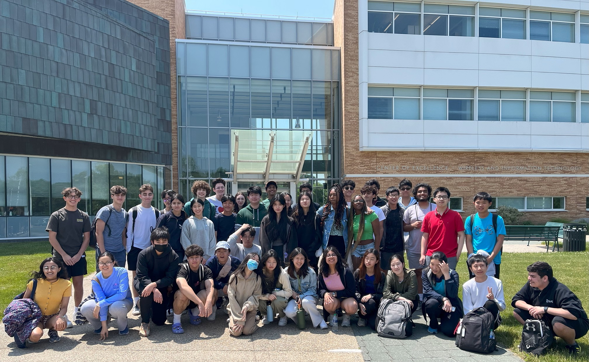 Jericho HS students in front of CEWIT building
