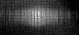 Diffraction pattern caused by binary linear zone plate with a
&pi;-phase jump