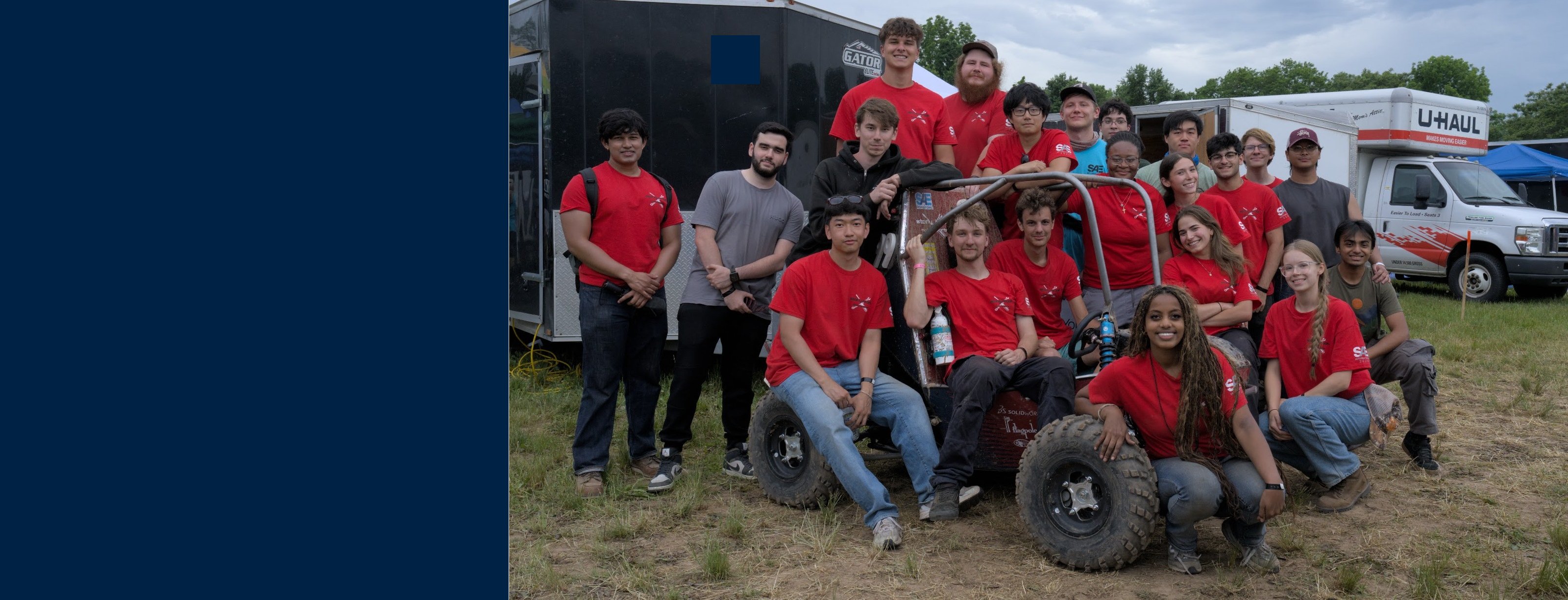 Motorsports team photo with the car