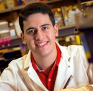 Joseph Bisulca in a lab coat