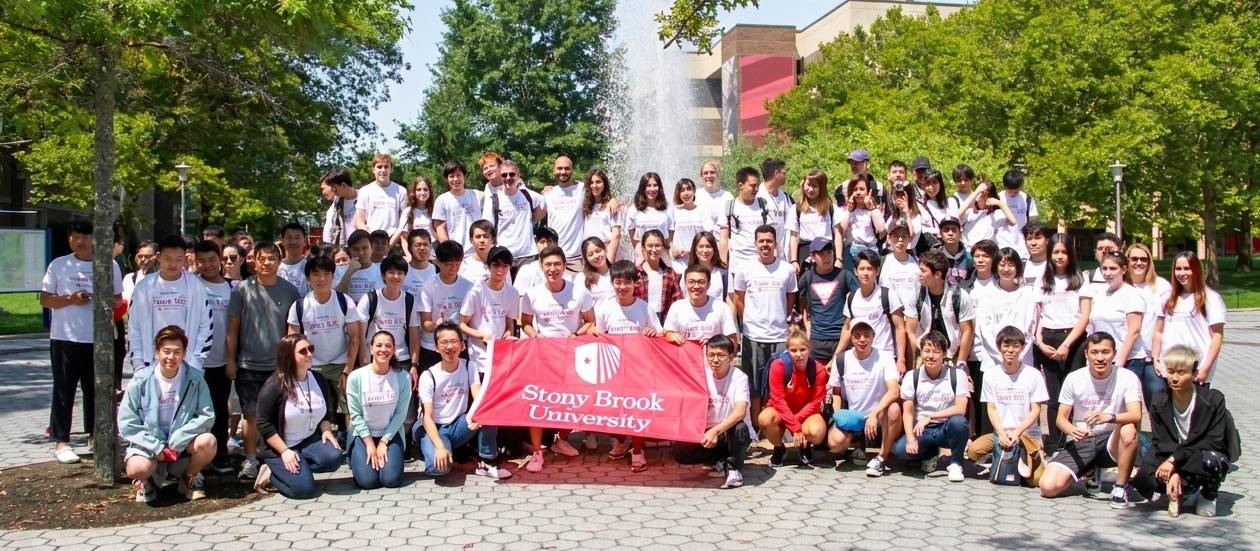 IEC students in front of the SBU Admin fountain