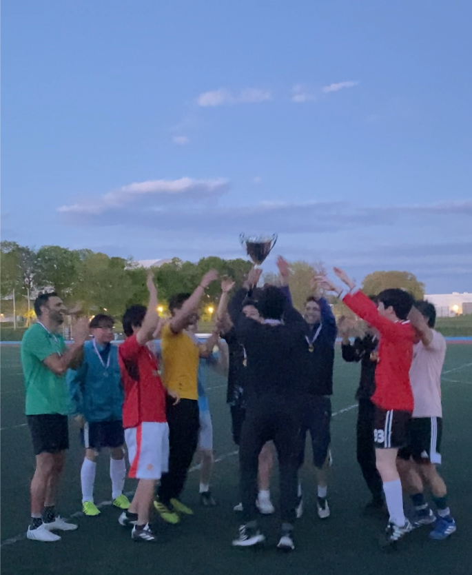 Condensed Matter celebrates winning the 2026 Physics Chair's Cup Soccer Tournament