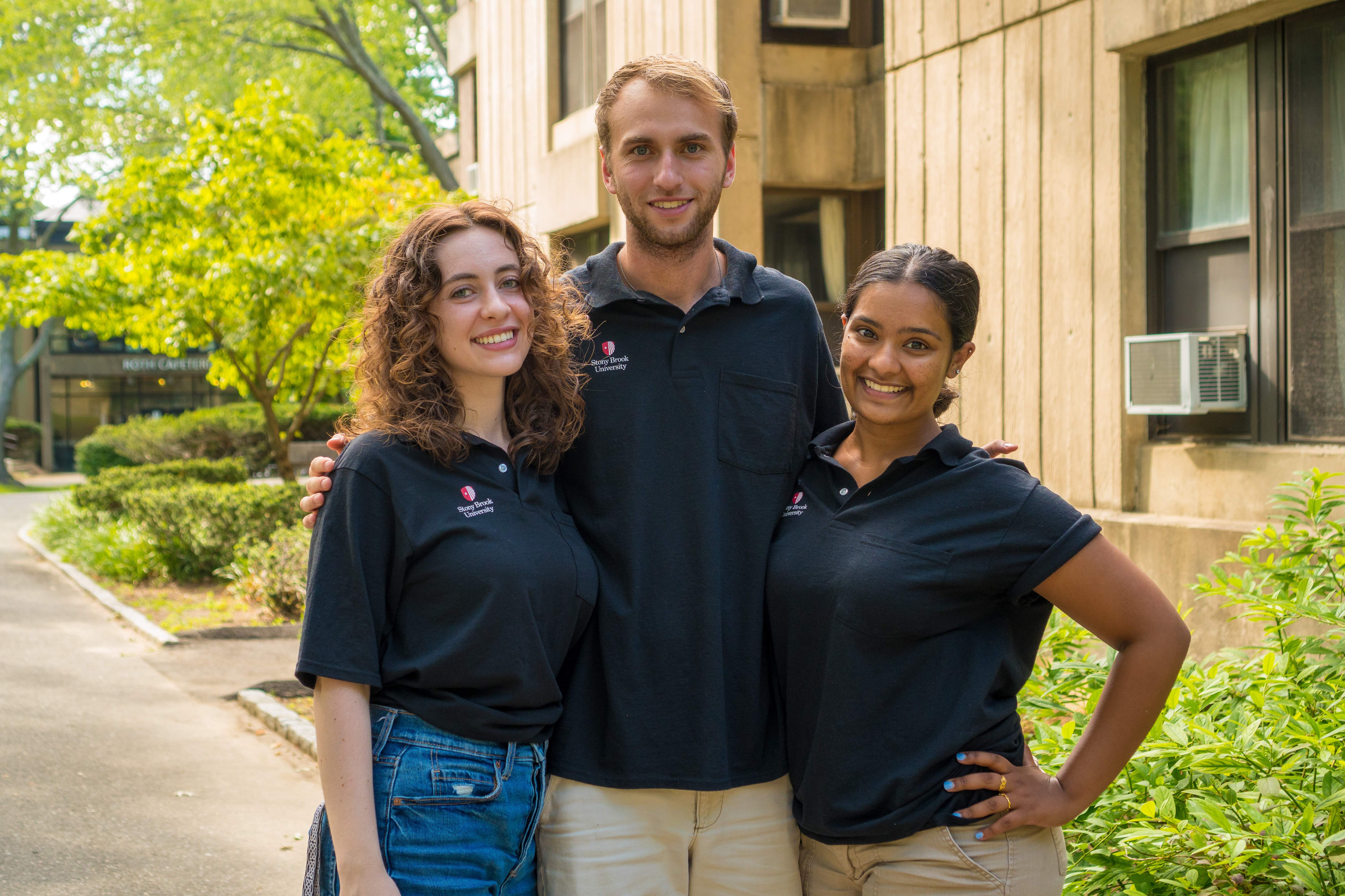 three residenti assistants pose together