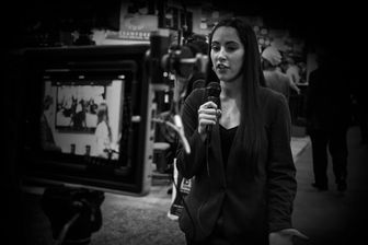 Student reporter filming a broadcast. Student reporter filming a broadcast.
