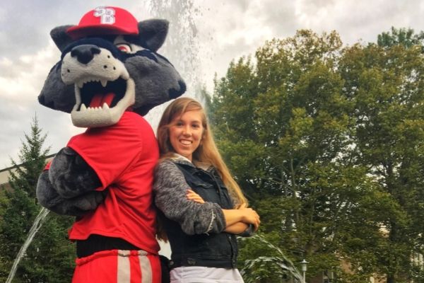 Anna Smith poses with Wolfie