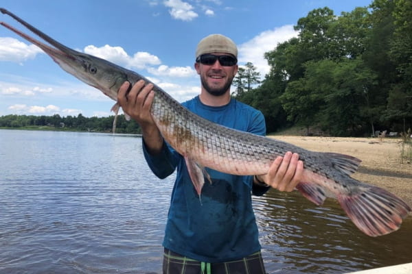 Brian holds a gar