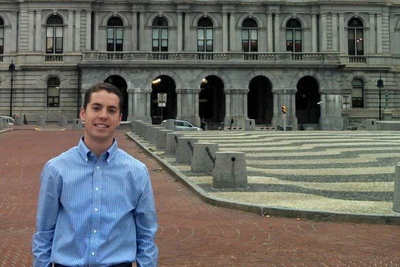 Christopher Lang stands in front of the New York Capitol Building in Albany Christopher Lang stands in front of the New York Capitol Building in Albany