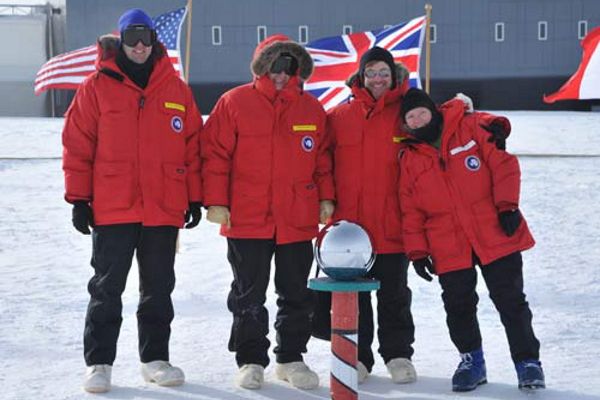 A group of people including Lisa Clough at the South Pole A group of people including Lisa Clough at the South Pole