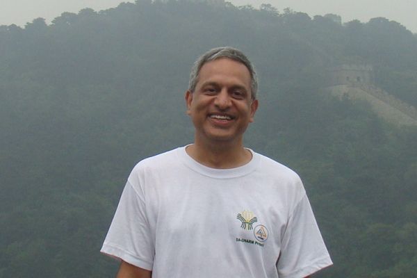 Sanjay Gupta stands in front of the Great Wall of China Sanjay Gupta stands in front of the Great Wall of China